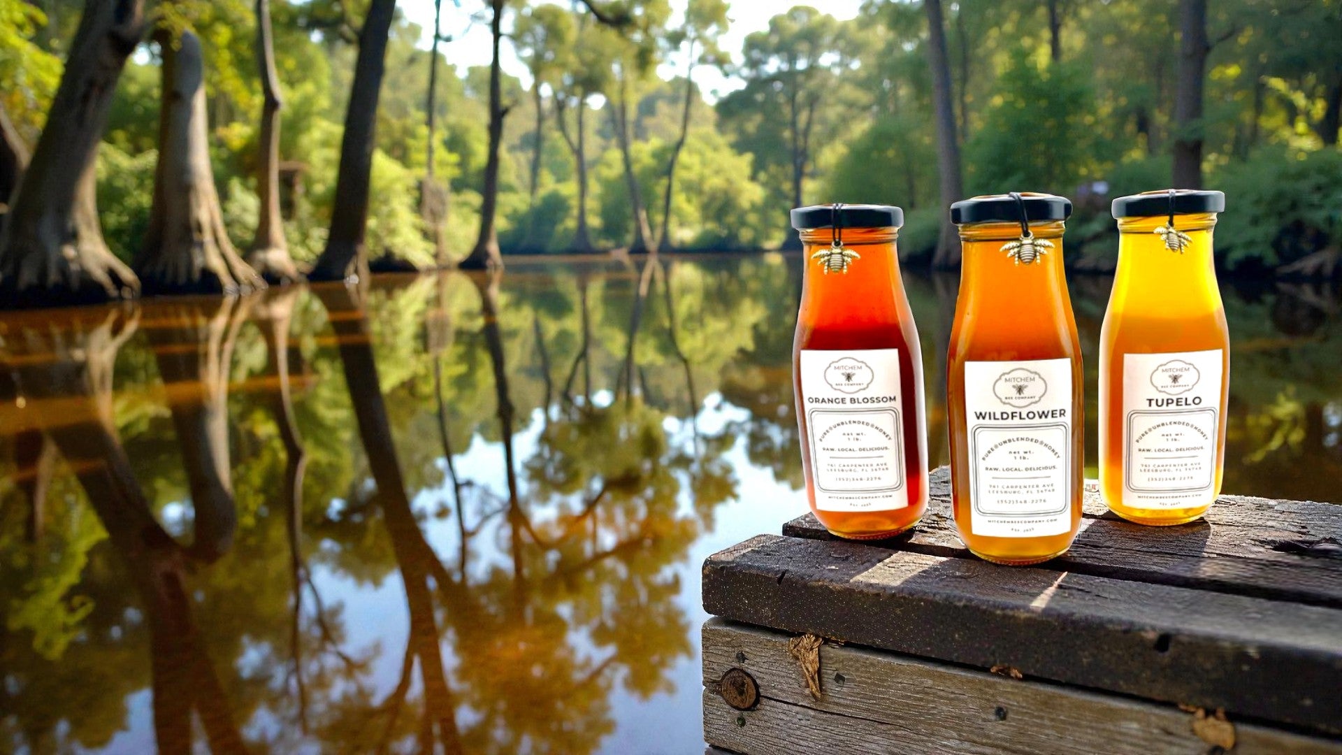 Three bottles of Wildflower & Honey on a wooden platform with a natural background